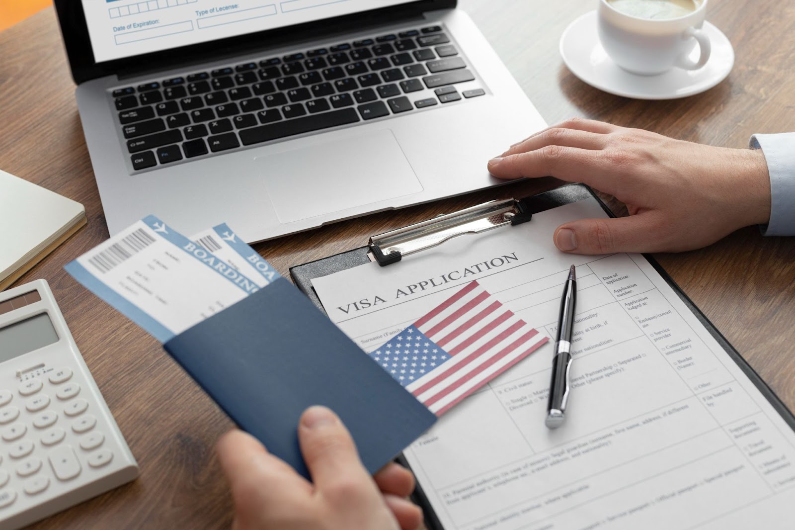 What factors should international medical graduates consider when choosing between J1 and H1B visas?